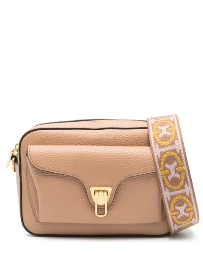 Coccinelle Small Beat Soft Cross Body Bag In Brown