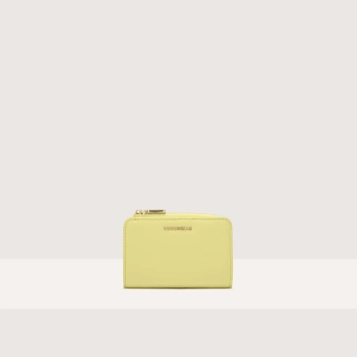 Coccinelle Small Grained Leather Wallet Metallic Soft In Lime Wash