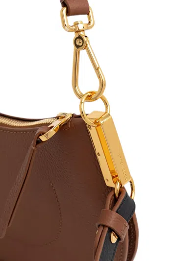 Coccinelle Small Sunup Pebbled Shoulder Bag In Brown