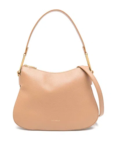 Coccinelle Soft Small Magic Shoulder Bag In Beis