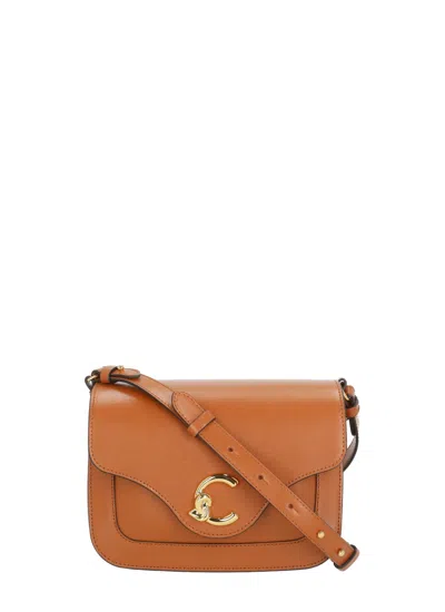 Coccinelle Structured Compact Leather C-me Small Bag In Brown