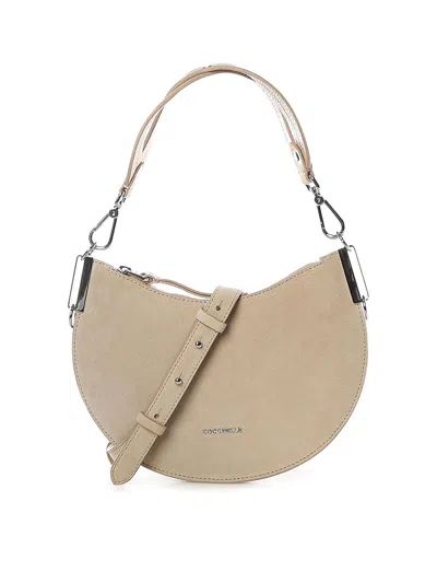 Coccinelle Sunup Small Leather Shoulder Bag In Sand