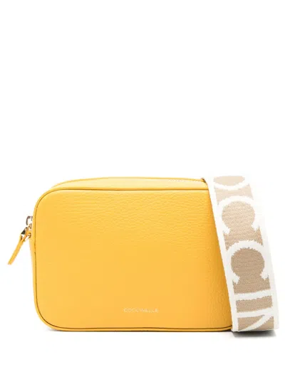 Coccinelle Tebe Cross Body Bag In Gelb
