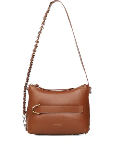 Coccinelle Zip-up Shoulder Bag In Brown