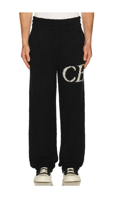 Cole Buxton Logo Knit Pants In Black