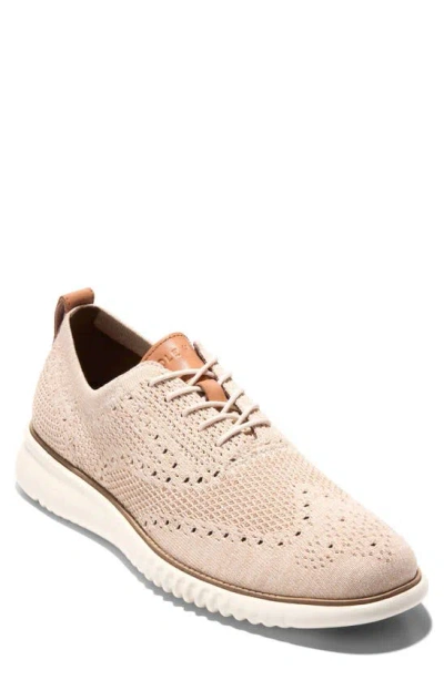 Cole Haan 2.zerogrand Stitchlite Wingtip In Sand Dollar/ Ivory