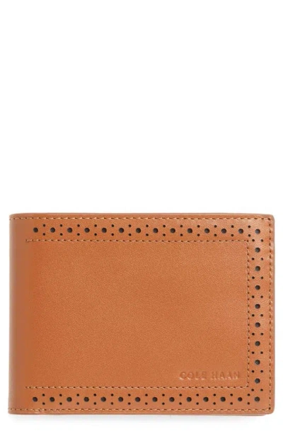 Cole Haan Brogue Leather Passcase In Brown