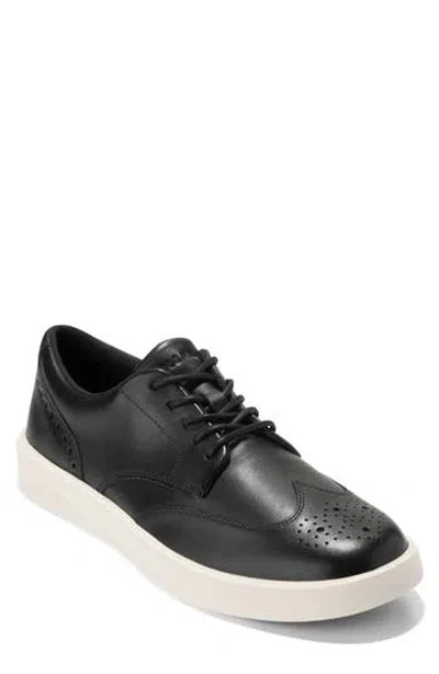 Cole Haan Grand Daily Wingtip Sneaker In Black/ivory