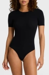 Commando Butter Short Sleeve Crewneck Bodysuit In Black In Black