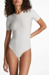 Commando Butter Short Sleeve Crewneck Bodysuit In White In Porcelain