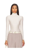 Commando Butter Long Sleeve Turtleneck Bodysuit In Porcelain In Porcelain