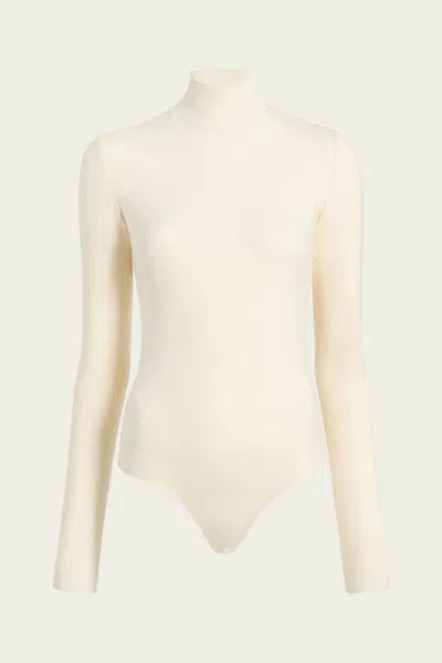 Commando Neoprene Turtleneck Bodysuit With Thumbholes In Ivory In Neutral