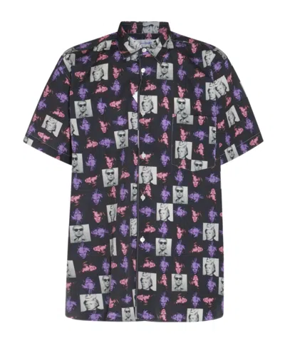 COMME DES GARÇONS A SHORT SLEEVED SHIRT