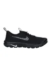 Comme Des Garçons Textured Black Sneakers With Low-profile Design And Distinctive Branding In Black