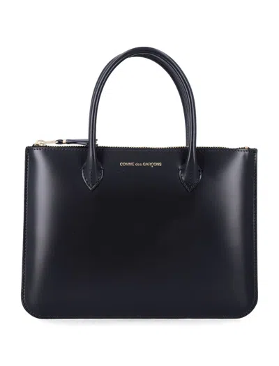 COMME DES GARÇONS COMME DES GARÇONS BLACK LEATHER WALLET BAG WITH HANDLES