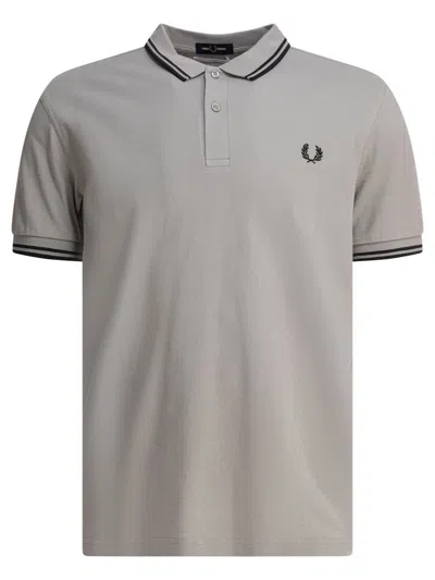 COMME DES GARÇONS COMME DES GARÇONS "CDG STRONG WILL" POLO SHIRT