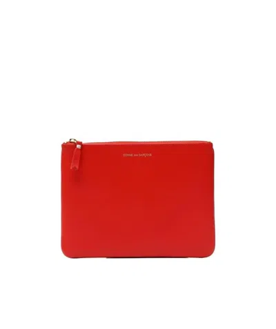 COMME DES GARÇONS COMME DES GARÇONS WALLET LOGO DETAILED ZIP-UP POUCH