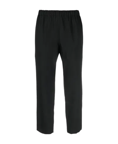 Comme Des Garçons Cropped Elasticated Wool Trousers In Black