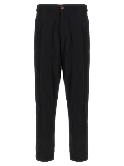 COMME DES GARÇONS CRUMPLED FABRIC TROUSERS WITH ZIP