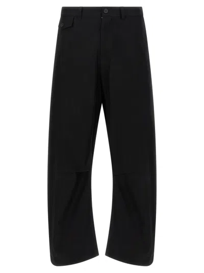 COMME DES GARÇONS CURVED LEG TROUSERS WITH KNEE PINCER DETAIL AND ADJUSTABLE BACK STRAP