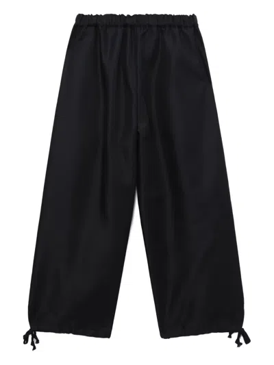 Comme Des Garçons Polyester Elastic Hem Pants In Black