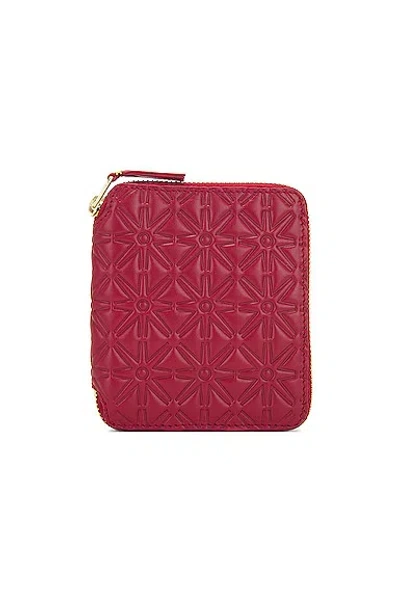 Comme Des Garçons Embossed Leather Zip Wallet In Red