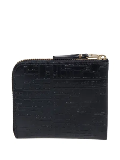 Comme Des Garçons Embossed-logo Wallet In Black