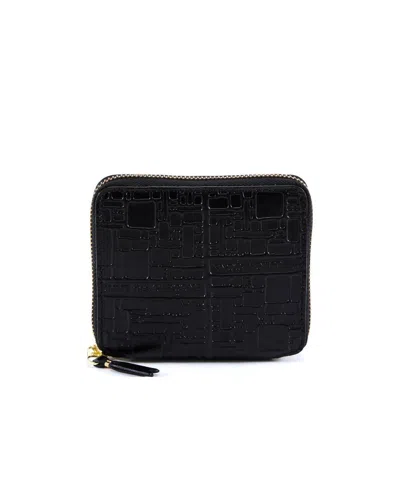 Comme Des Garçons Embossed-logo Wallet In Black