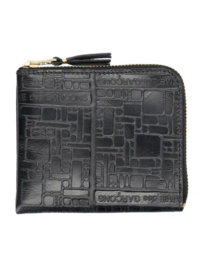 Comme Des Garçons Embossed Logotype Wallet In Black