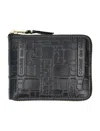 Comme Des Garçons Embossed Logotype Wallet In Black