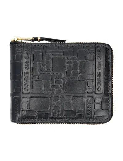 Comme Des Garçons Embossed Logotype Wallet In Black