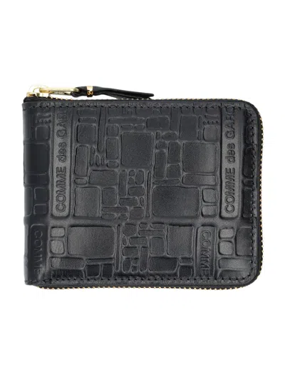 Comme Des Garçons Embossed Logotype Wallet In Black