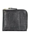 Comme Des Garçons Embossed Logotype Wallet In Black