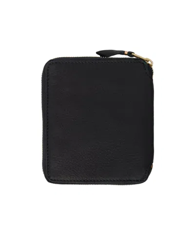 COMME DES GARÇONS EMBOSSED PURSE