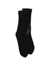 Comme Des Garçons Fishnet Socks In Black
