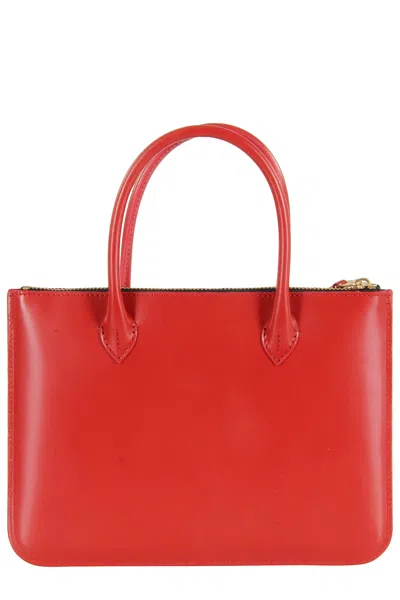 Comme Des Garçons Handles In Red
