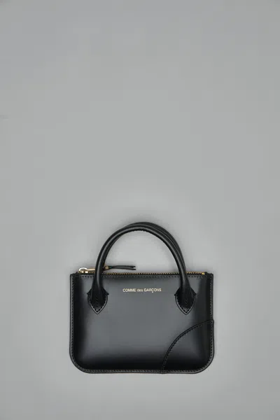 Comme Des Garçons Handles In Black