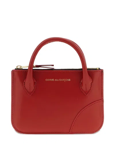 Comme Des Garçons Handles Line Logo Leather Mini Bag In Red