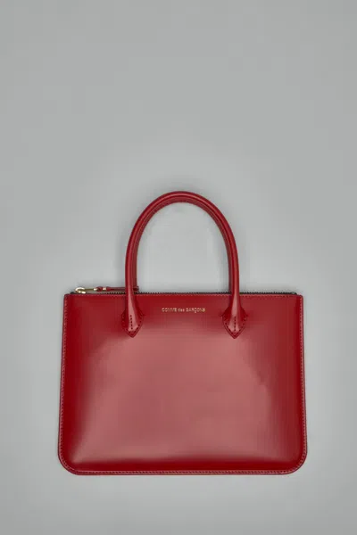 Comme Des Garçons Handles In Red