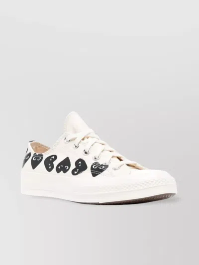 COMME DES GARÇONS HEART PRINT LOW TOP SNEAKERS