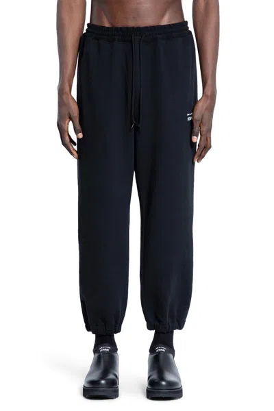 Comme Des Garçons Homme Deux Printed Sports Trousers In Black