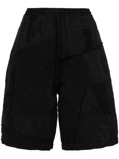 Comme Des Garçons Homme Deux Ripped Panelled Shorts In Black