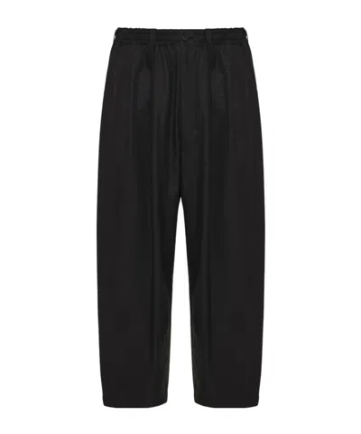 Comme Des Garçons Homme Wide-leg Pleated Trousers In Black