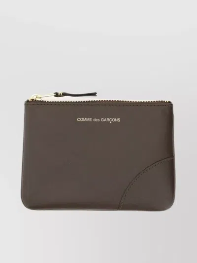 COMME DES GARÇONS LEATHER LINE WITH INTRICATE STITCHING DETAIL