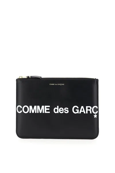 Comme Des Garçons Leather Pouch With Logo Print In Black