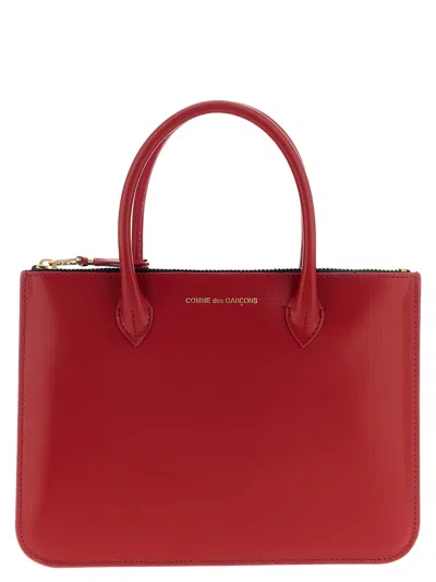 Comme Des Garçons Leather Top Handle Bag In Red