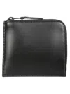 Comme Des Garçons Textured Leather Wallet With Unique Finish