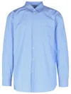 Comme Des Garçons Collared Shirt With Curved Hem And Pocket In Blue