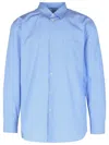 Comme Des Garçons Collared Shirt With Curved Hem And Pocket In Blue