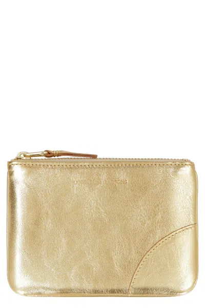 Comme Des Garçons Logo Detail Flat Leather Pouch In Gold